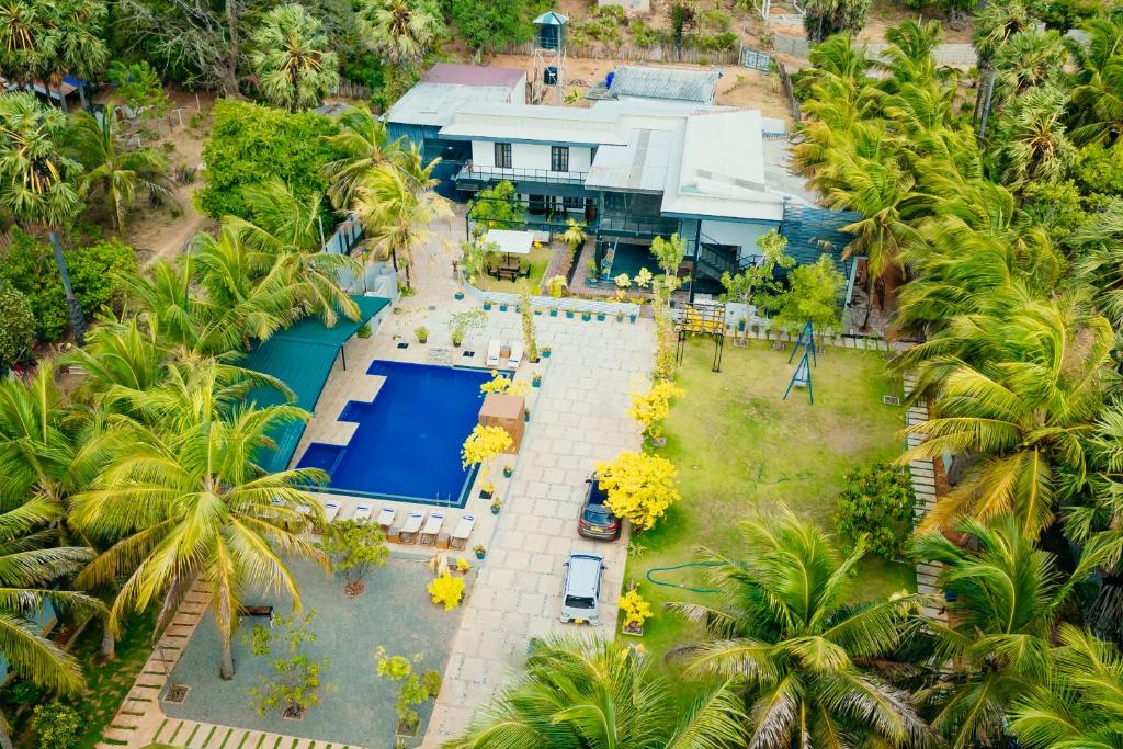 Aerial view of Aathi Resort and its pool